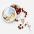 Rosary with rose petal